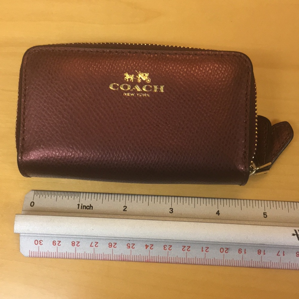 Coach maroon pebbled leather accordion wallet